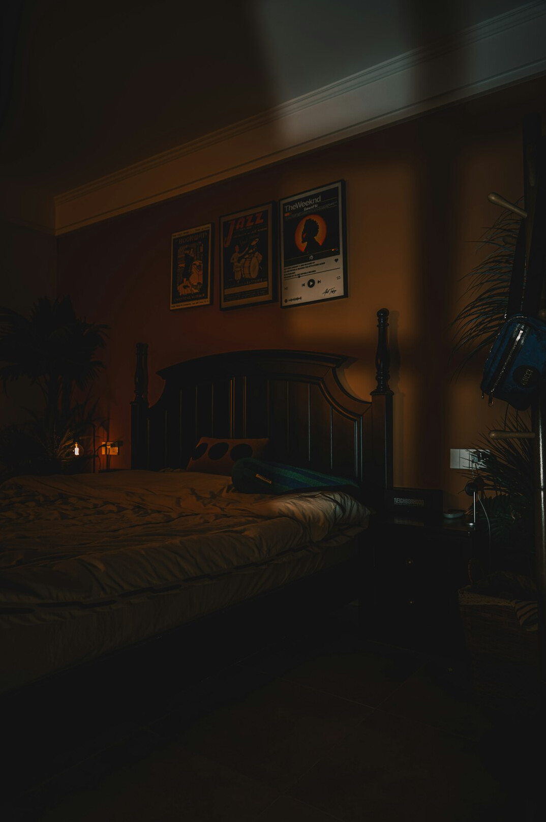 person reading book in dark bedroom
