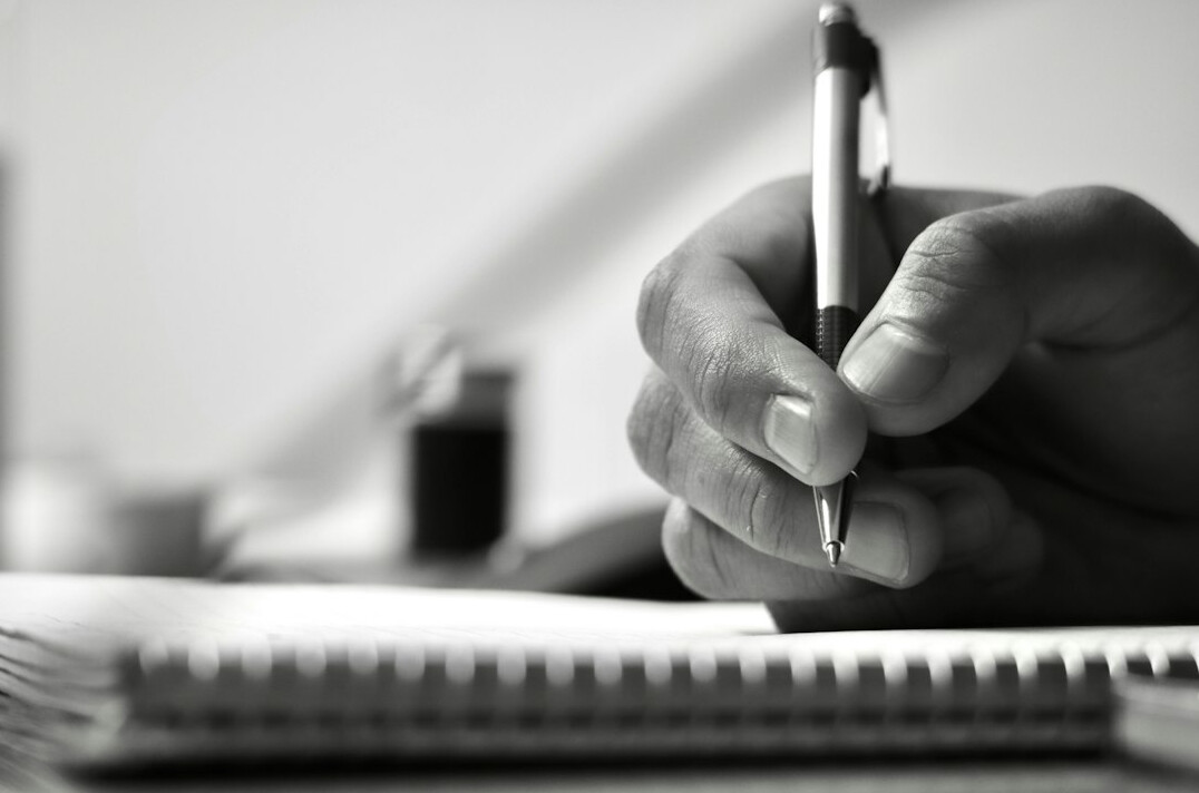 person editing manuscript